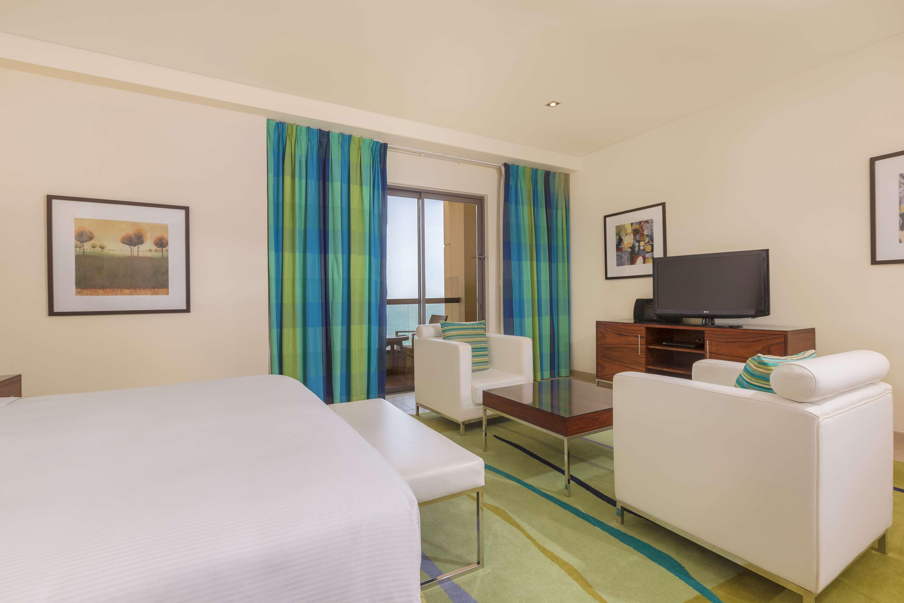 Hilton The Walk Отель 4*