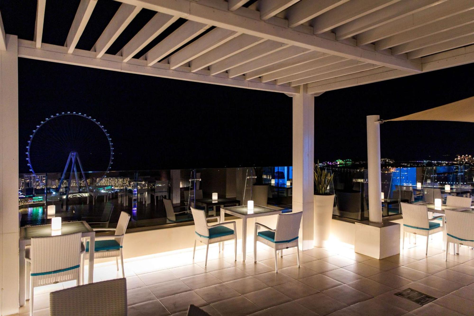 Hilton The Walk Отель